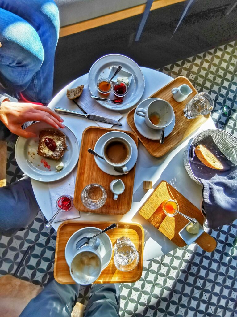 A breakfast scene depicting people coming together in love and friendship.